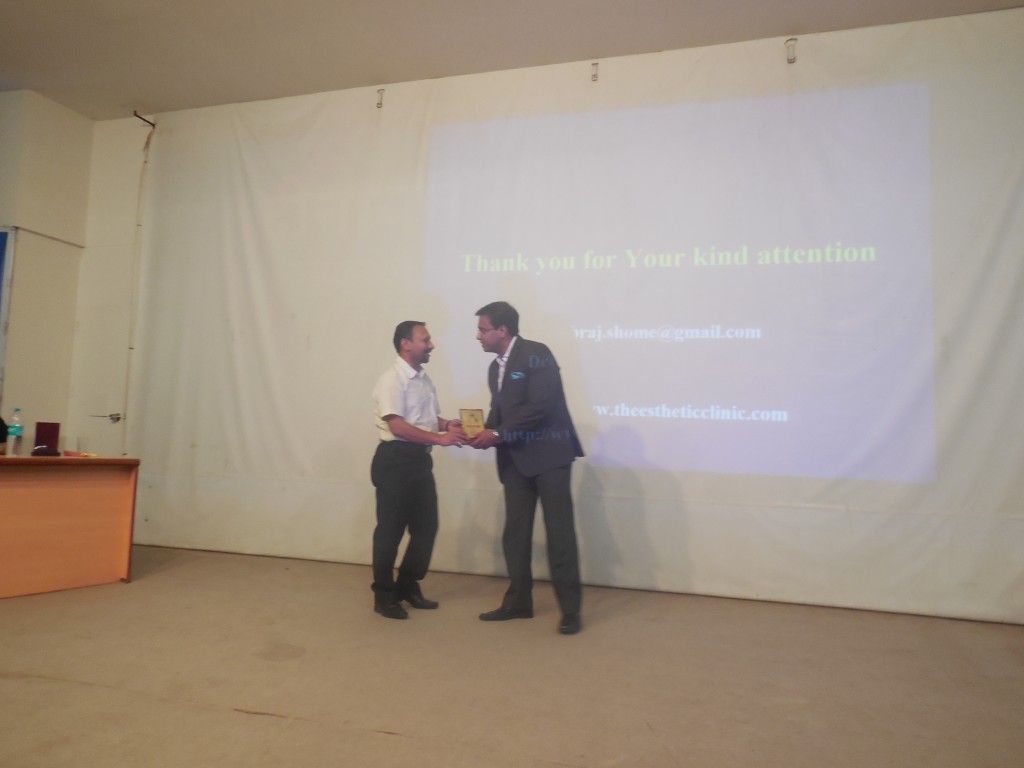Dr. Debraj Shome being felicitated at the plastic surgery meeting,Pune, June 2015, post his talk on the "The aging face and the mid-face lift".